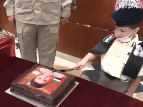 Abu Dhabi Police bring joy to a child born on December 2 to mark the UAE National Day